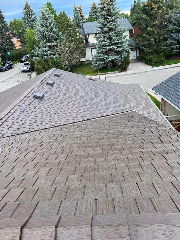 Aerial rubber shake roof hip and valley street