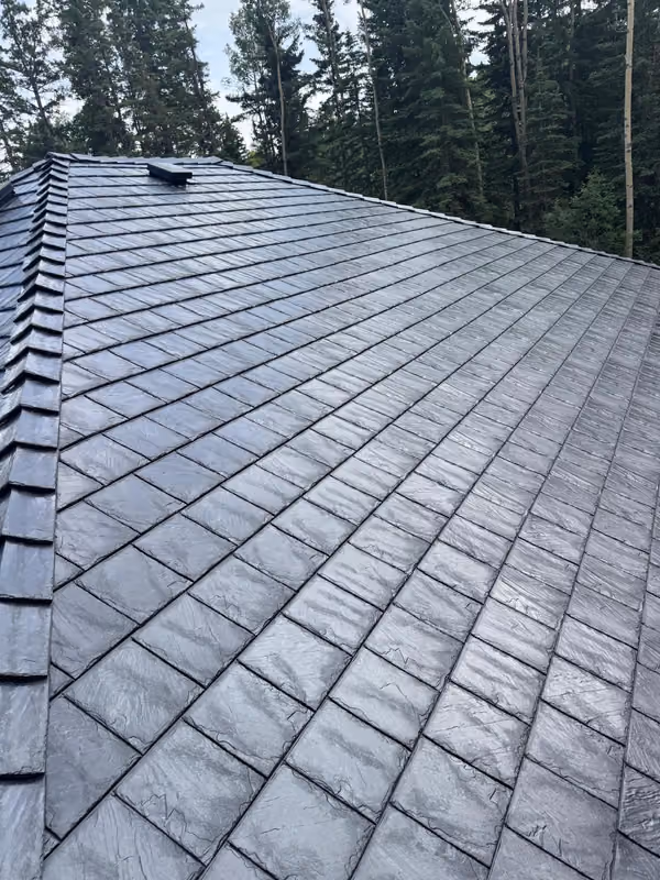 Close up moulded rubber slate shingles hip roof