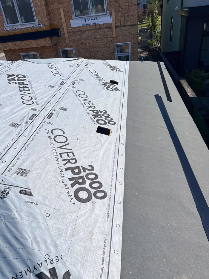 Coverpro underlayment and membrane on low slope roof