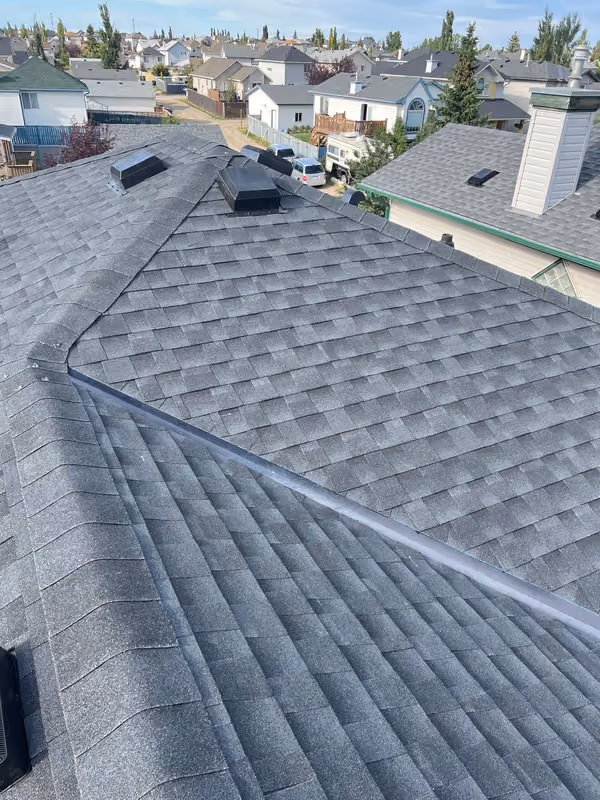Finished asphalt shingles hip and ridge overview