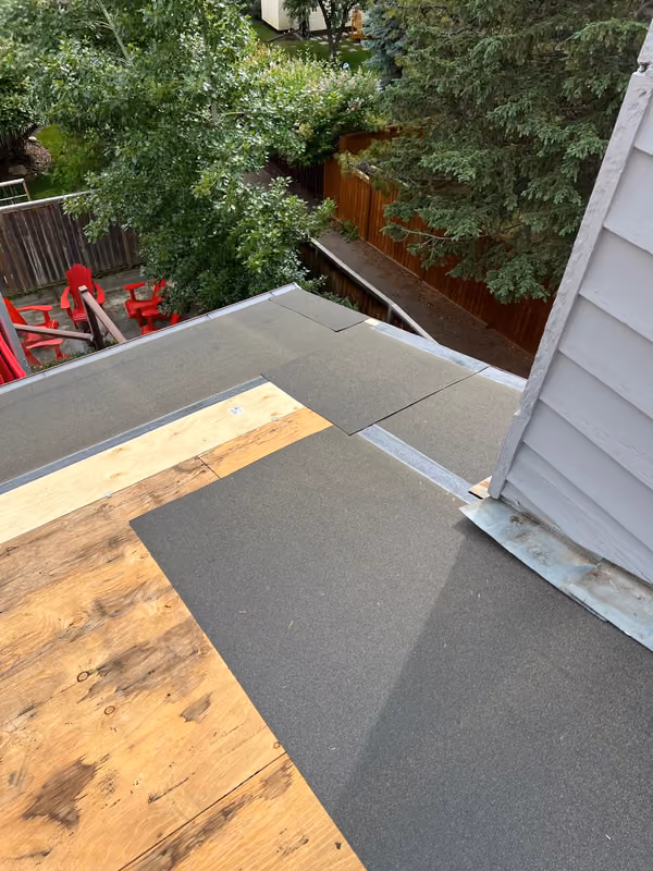 Granulated membrane installed over plywood low slope deck