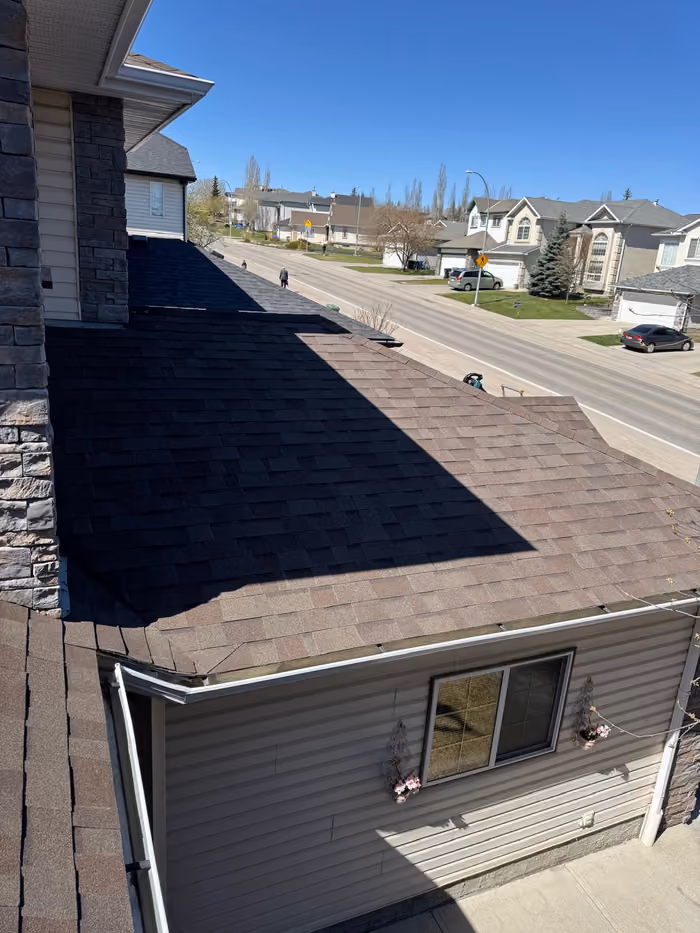 Ground facing roof slope and eavestrough condition view