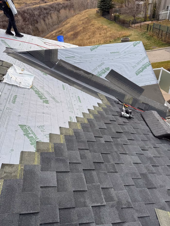 Hip metal flashing over underlayment mid shingle install