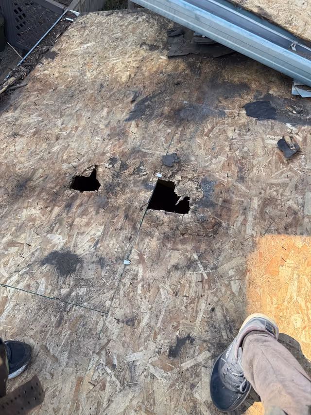 Holes punched through deteriorated OSB deck