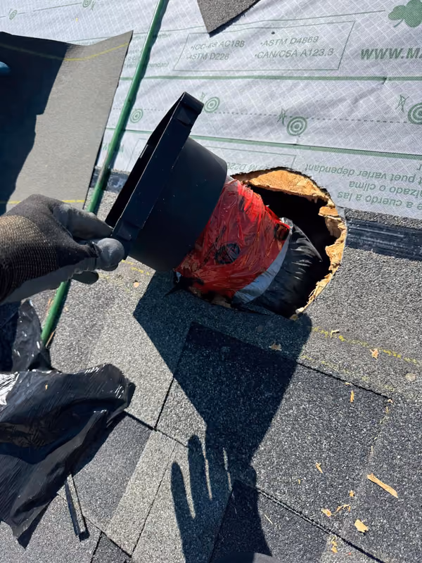 Installing new roof vent through cut deck opening