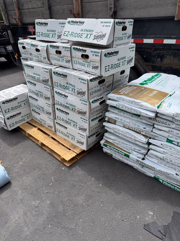 Malarkey EZ ridge boxes and bundles on pallet at truck
