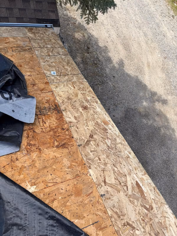 New OSB sheathing panels installed over deck