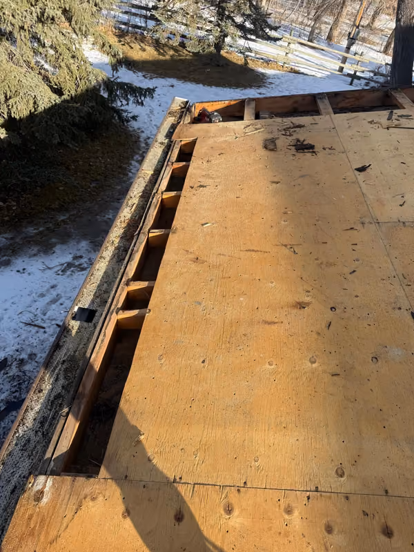 Open rafter bay at eave during winter tear off