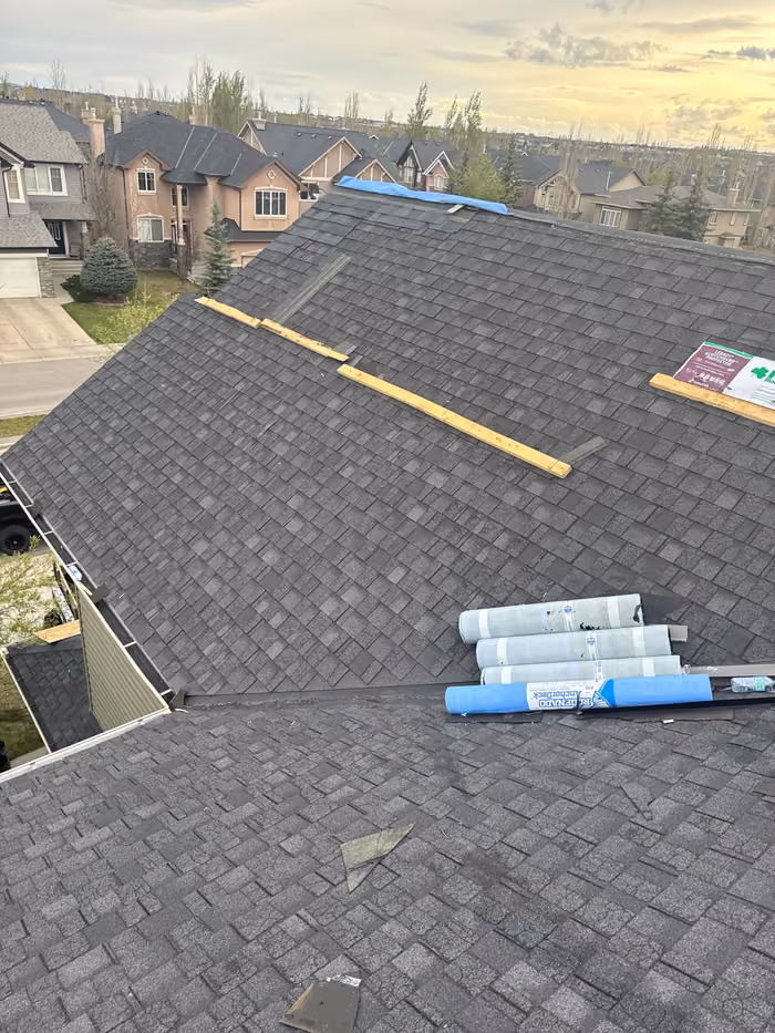 Ridge cap preparation with roll vent and nailer boards