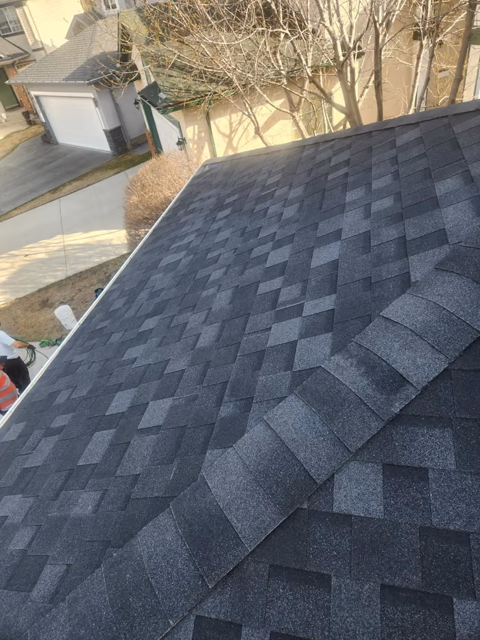 Ridge view finished charcoal shingles front elevation