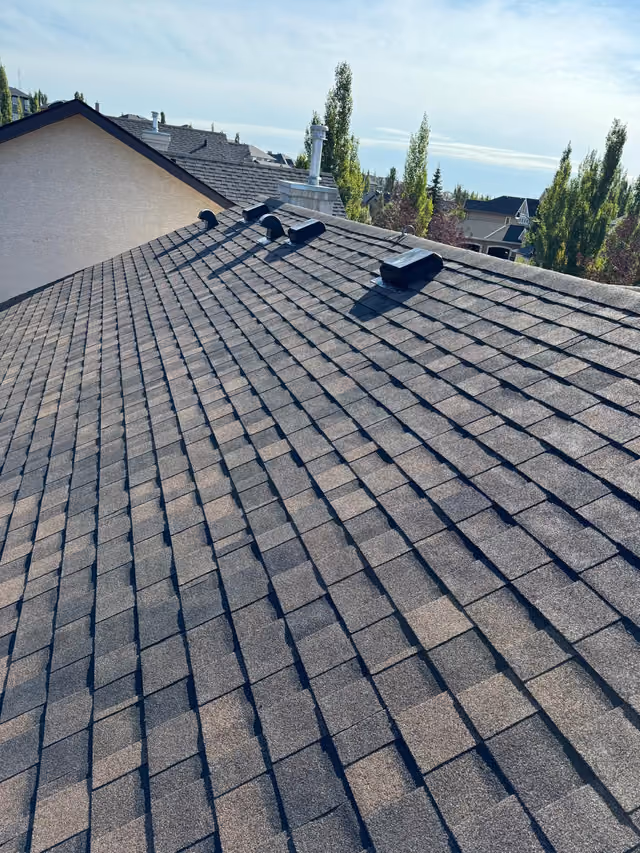 Ridge view weathered asphalt shingles granule wear
