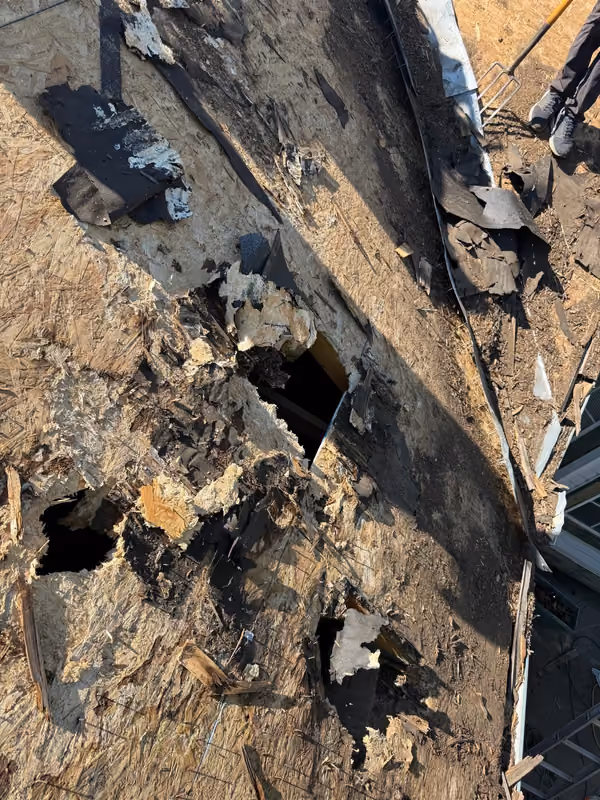 Rotted valley sheathing with multiple holes