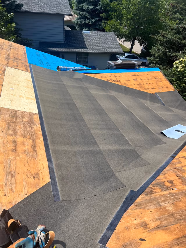SBS cap sheet rolled over low slope plywood