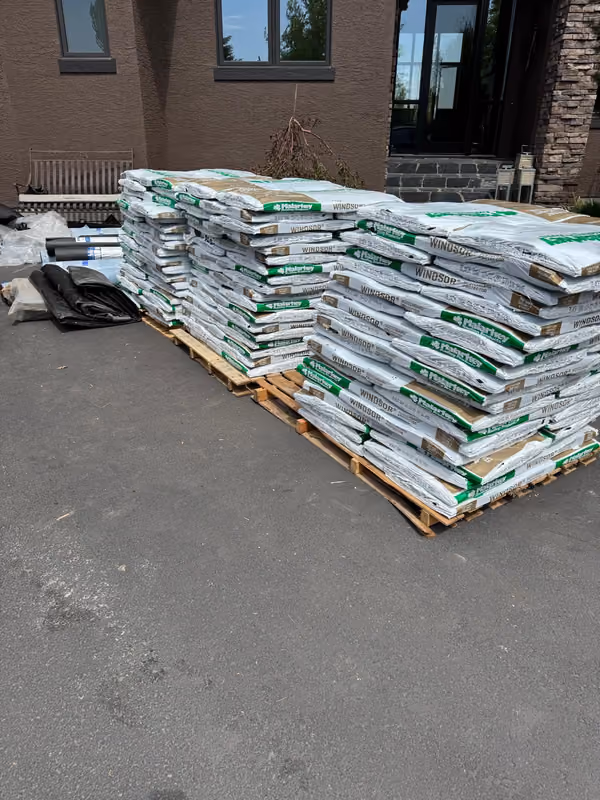 Shingle bundle pallets delivered in driveway