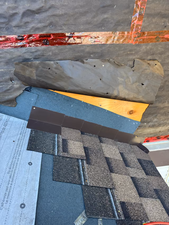 Starter shingles and step flashing over ice and water