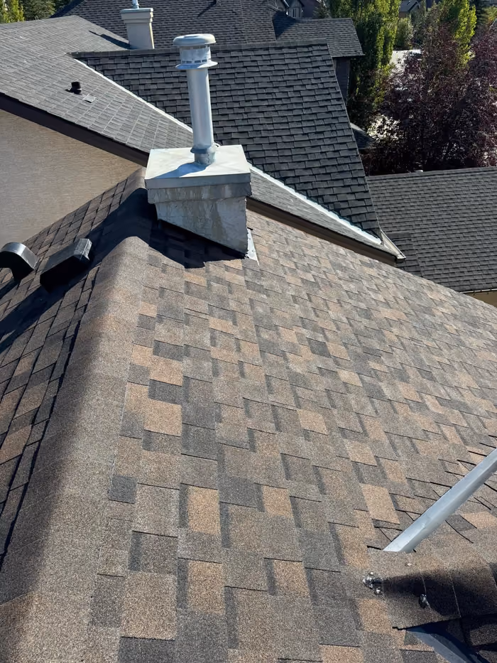 Stucco chimney chase metal flue shingle roof inspection
